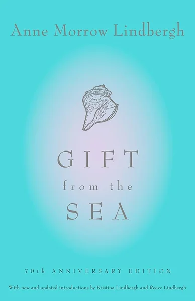 Turquoise book cover of "Gift from the Sea" by Anne Morrow Lindbergh. Features a conch shell illustration and subtle, elegant typography. Tranquil tone.
