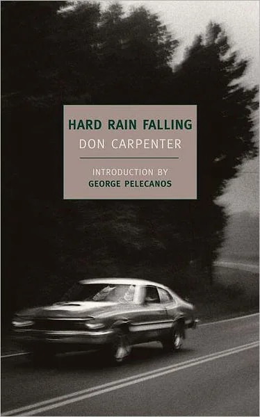 Cover of "Hard Rain Falling" by Don Carpenter, featuring a blurred image of a car driving on a road with trees in the background. Introduction by George Pelecanos.