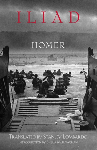 Normandy beach landing scene with soldiers wading ashore, boats in view. Cover text reads: “Iliad. Homer.” Tone is intense and dramatic.